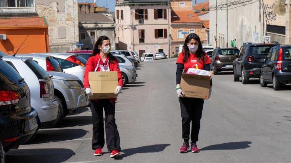 Image of volunteers caring care kits.